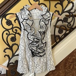 Anne Fontaine black and white sleeveless blouse.
